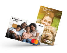 close-up of two credit cards, one with a group of people and the other a woman with her dog